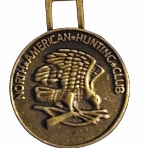 1980 North American Hunting Club Bronze Charm Token Coin Eagle Guns Bow & Arrow